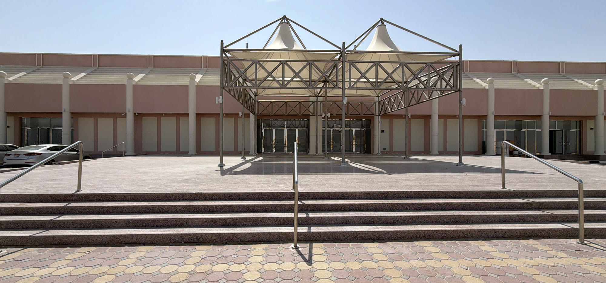 Remah Wedding Hall grand entrance canopy at dusk